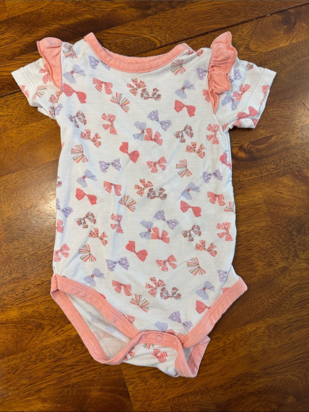 Milkberry Pink Bow Print One-Piece Bodysuit